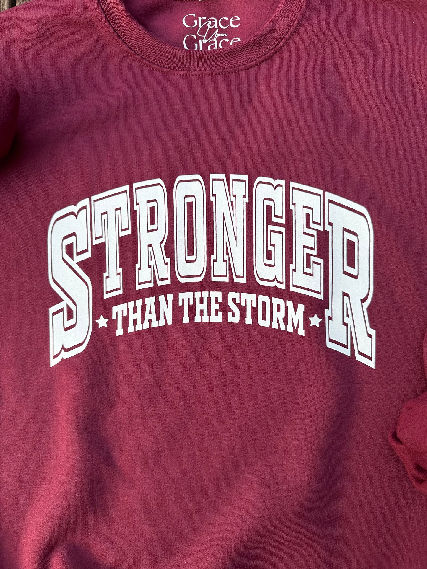 Stronger Than The Storm Crewneck