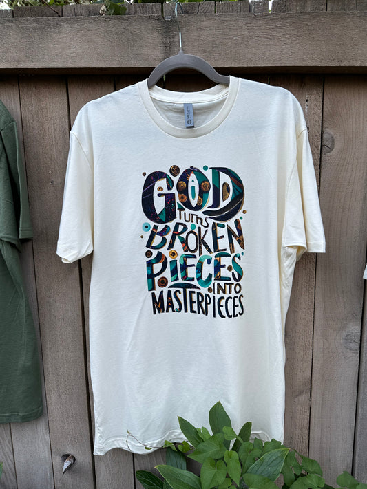 GOD TURNS BROKEN PIECES INTO MASTERPIECES TEE